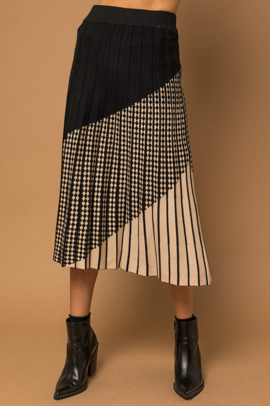 Falda midi tipo jersey plisada con estampado mixto