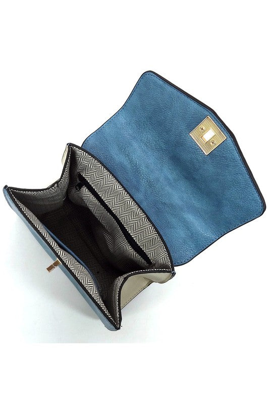 Bolso satchel con solapa y cierre giratorio en bloques de color