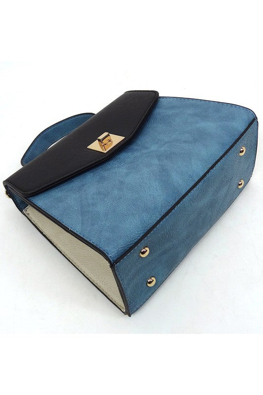 Bolso satchel con solapa y cierre giratorio en bloques de color