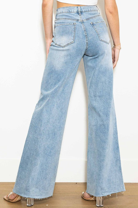 Jeans anchos de talle alto y cruzados