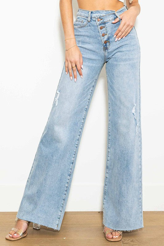 Jeans anchos de talle alto y cruzados