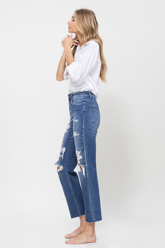 Jeans rectos relajados con tobillos de talle alto desgastados