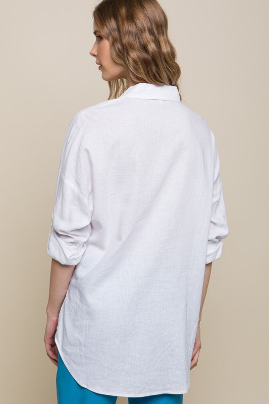 Camisa oversize de lino con botones y dos bolsillos