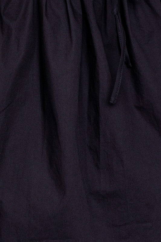 Vestido babydoll de manga corta con detalle de lazo en la espalda