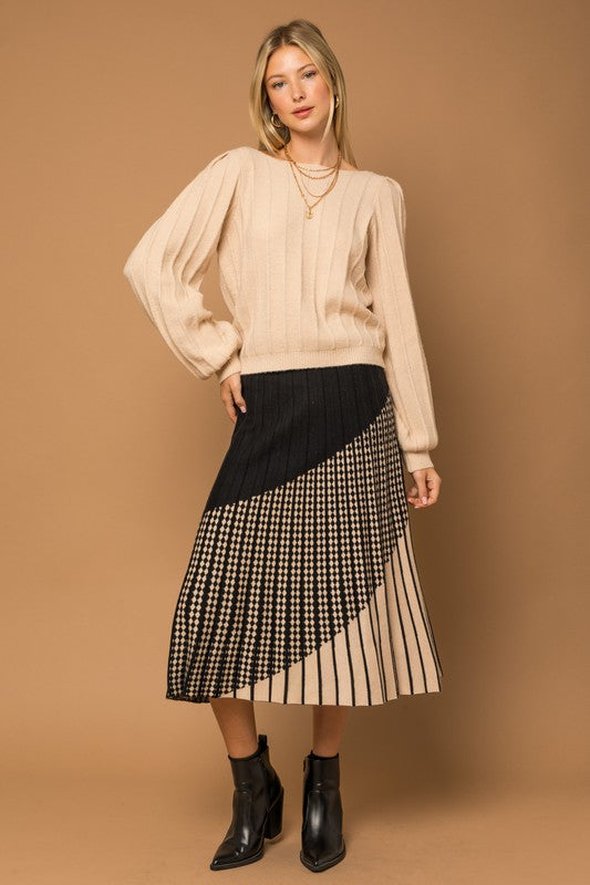 Falda midi tipo jersey plisada con estampado mixto