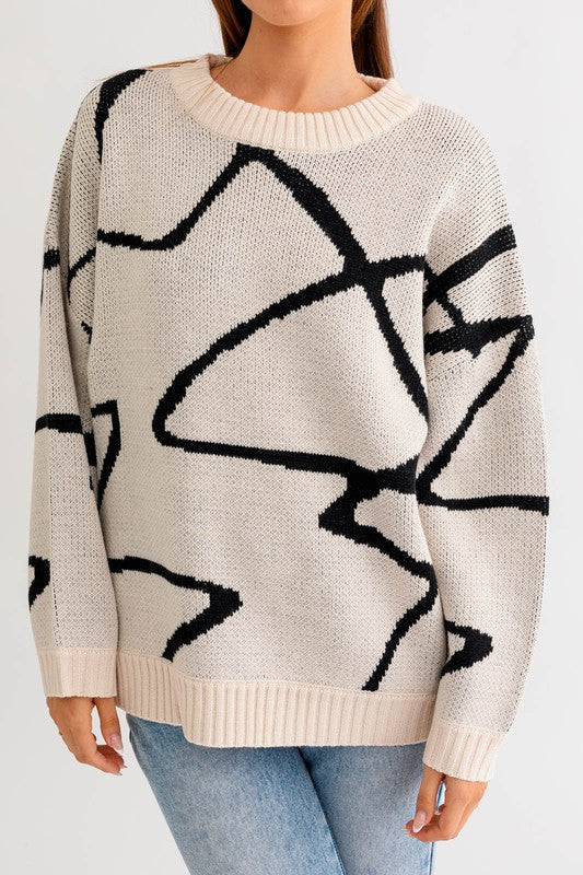 Top tipo suéter extragrande con estampado abstracto