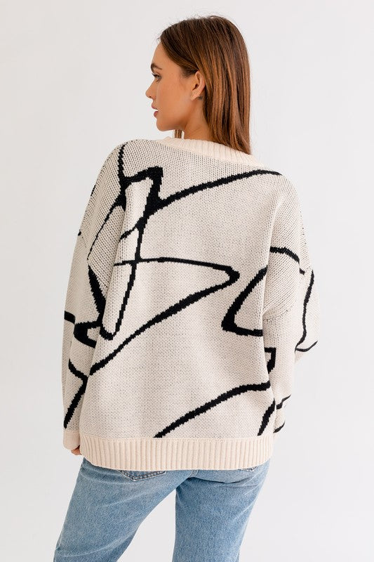 Top tipo suéter extragrande con estampado abstracto