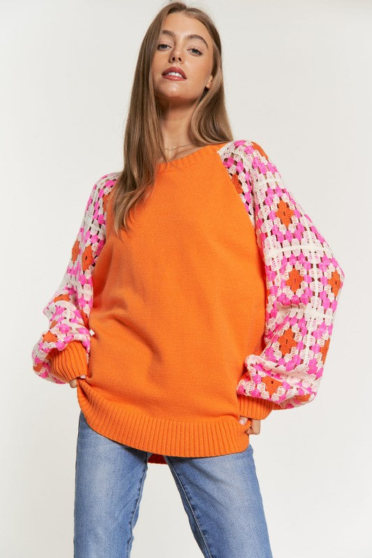 Suéter de manga larga con detalle de crochet