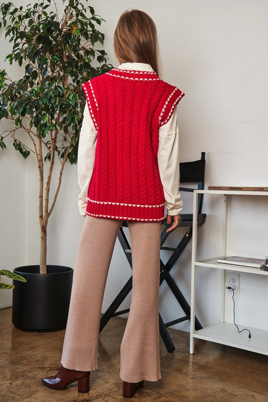 Suéter liso con cuello en V, sin mangas y detalle de bolsillo